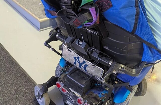 Back of a Permobil power wheelchair in for a complex rehab repair